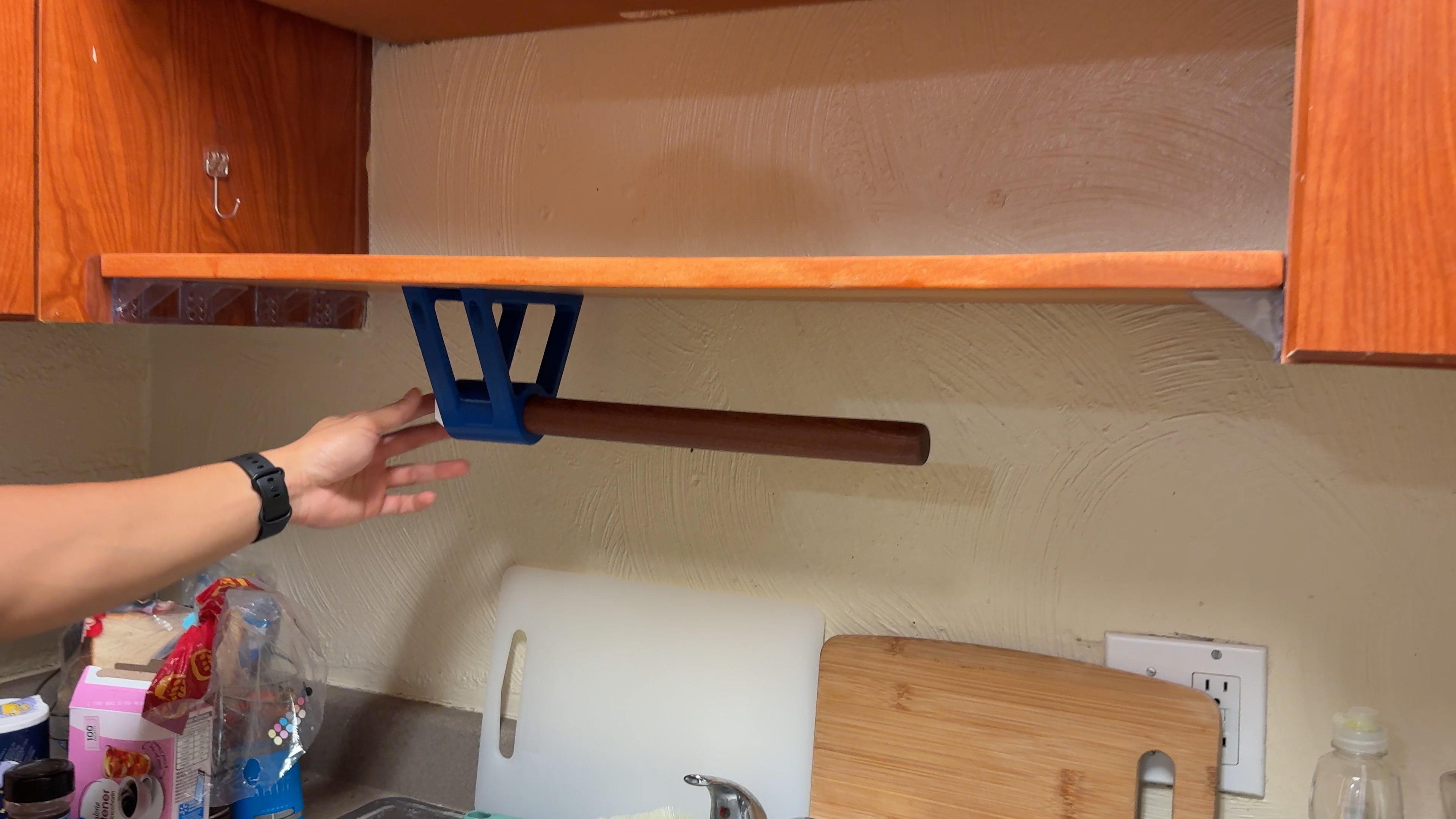 Wooden shelf with removable roller pin mount.